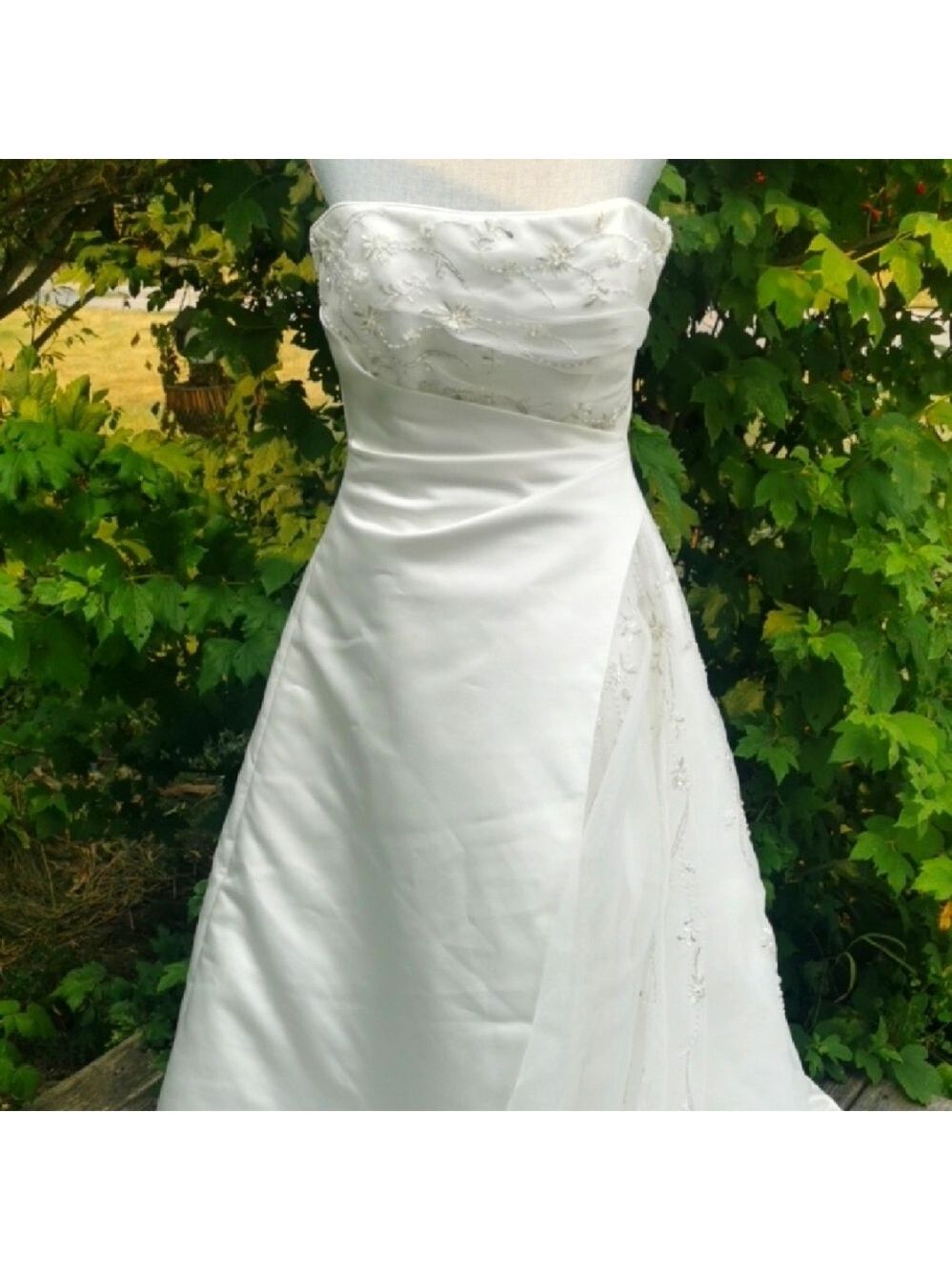 MaggieSottero strapless corsetback floor length embroidered sequins and beads 10